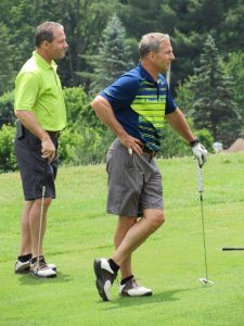 golfers enjoying a sunny day on the course